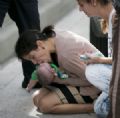  Estado de sade de beb salvo pela tia nos EUA  estvel, diz jornal Pamela Rauseo tenta fazer seu sobrinho de 5 meses voltar a respirar no meio de rodovia nos EUA (Foto: The Miami Herald, Al Diaz/AP)