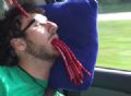 Rapaz dorme em carro e acorda com boca cheia de doces em pegadinha Micah foi filmado dormindo e tendo a boca 'entupida' de doces pelos amigos (Foto: Reproduo/YouTube/Joshua Farquharson)