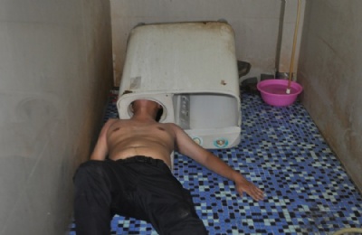  Chins  resgatado aps entalar a cabea em mquina de lavar roupa Chins precisou ser resgatado aps entalar a cabea em mquina de lavar roupa (Foto: Reuters)